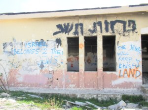 Settlers, that come every week, leave messages in the form of graffiti.